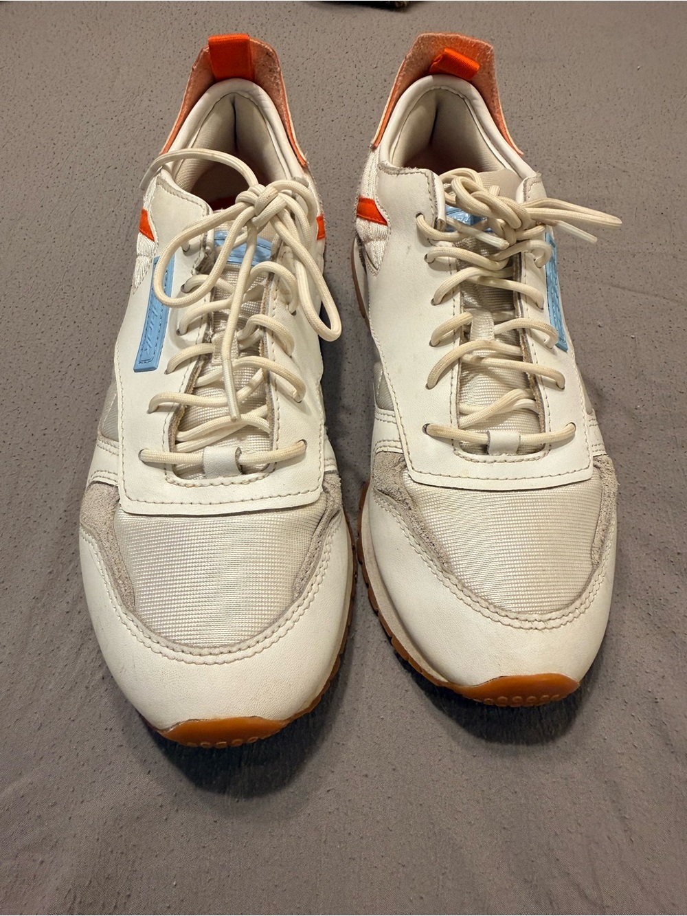 Casual White Sneakers with Orange and Light Blue Accents